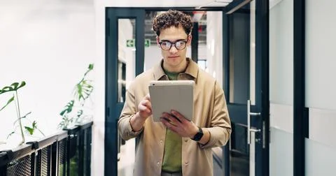 Creative, man and research with tablet in office building for web design or.. Stock Photos