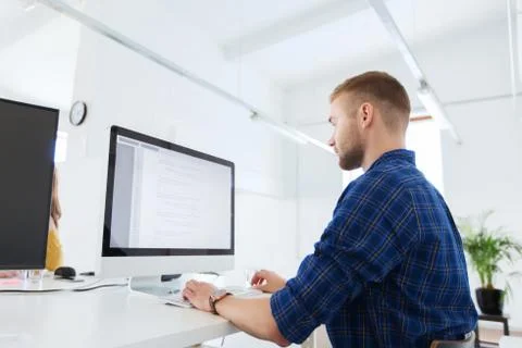 Creative man or programmer with computer at office 스톡 사진