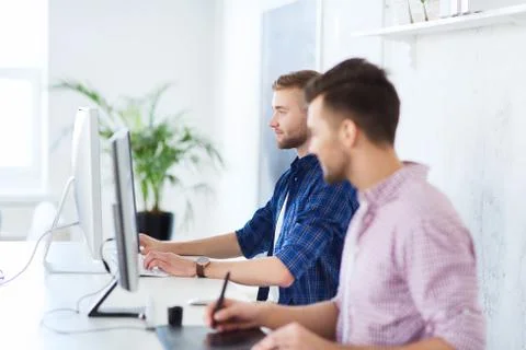 Creative man or student with computer at office 写真素材