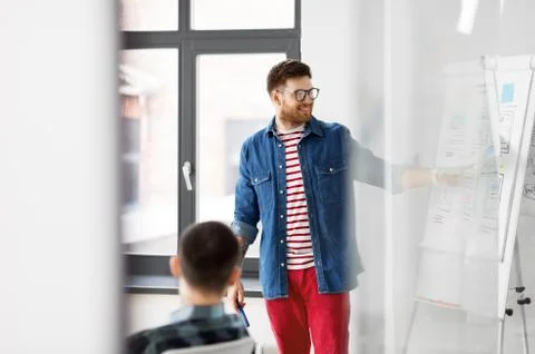 Creative man showing user interface at office 스톡 사진