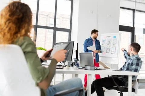 Creative man showing user interface at office Foto stock