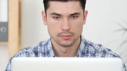 Creative Man Working on Laptop, Front View Stock Footage