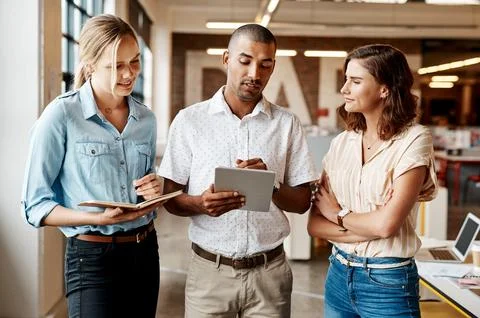 Creative, manager and team in office with tablet, campaign briefing and fee.. Stock Photos