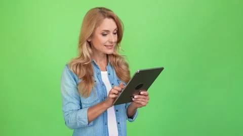 Creative manager lady hold tablet scroll options point finger genius solution 動画素材 163049231