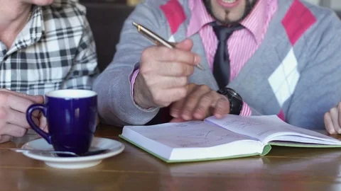 Creative meeting in a cafe. Close-up Stock Footage 85224707