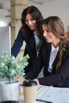 Creative, mentor or team in office with computer, content strategy or advice on  Stock Photos