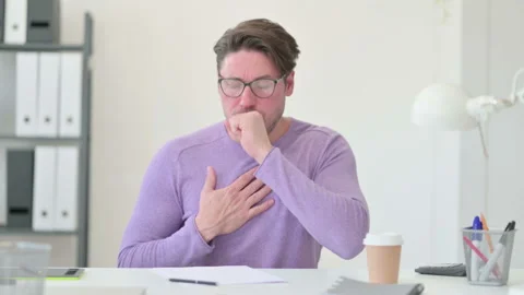 Creative Middle Aged Man Coughing in Office 스톡 동영상 143562294