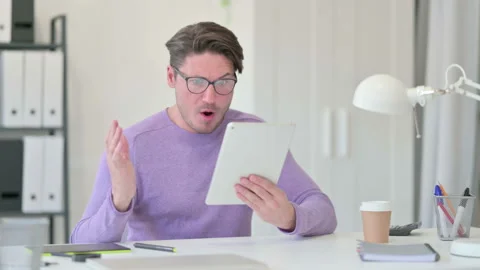 Creative Middle Aged Man having Loss on Tablet Stock Footage 143568968