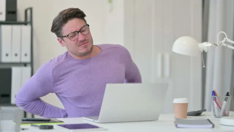 Creative Middle Aged Man with Laptop having Back Pain in Office 스톡 동영상 143569744