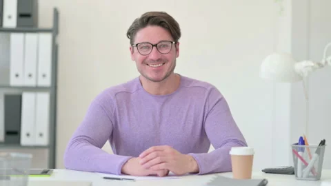 Creative Middle Aged Man Smiling at the Camera Stock Footage 143563011