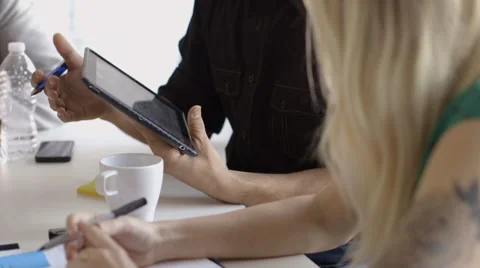Creative millennial business people using digital tablet in meeting Stock Footage 66986524