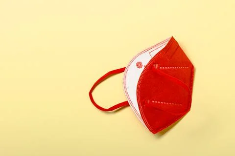 Creative minimal flat lay layer with KN95 or N95 FFP2 mask for protection pm 2.5 Stock Photos