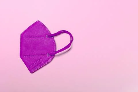 Creative minimal flat lay layer with KN95 or N95 FFP2 mask for protection Stock Photos