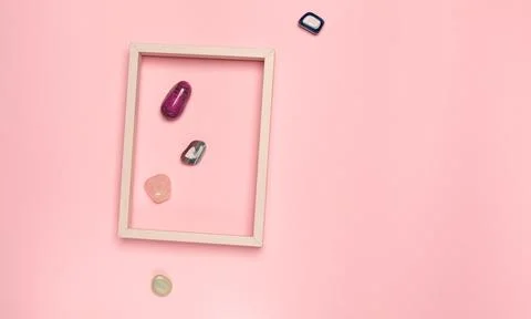 Creative minimal layer with frame and ornamental stones Stock Photos