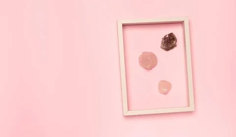 Creative minimal layer with frame and ornamental stones Stock Photos