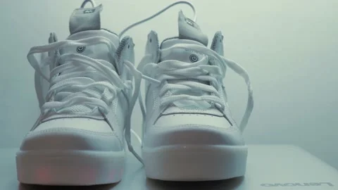 Creative minimal paper idea. Concept white shoe with white background. Stock Footage 168905991