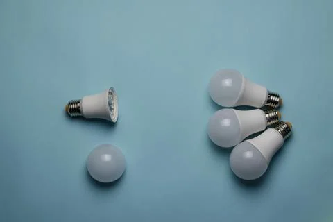 Creative minimalist composition with LED lights on a blue background. Stock Photos