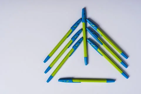 Creative minimalistic composition, Christmas tree made of ballpoint pens on a Stock Photos