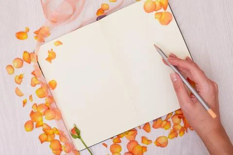Creative mock up layout made with copy space on table. Open sketchbook. Hand Stock Photos