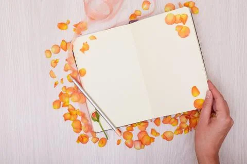 Creative mock up layout made with copy space on table. Open sketchbook. Hand Stock Photos