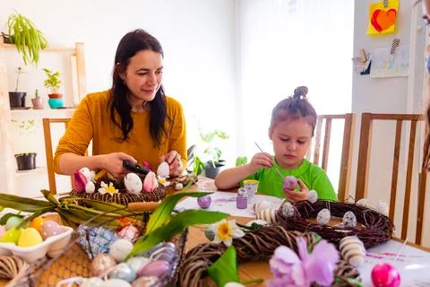 Creative mother organized Easter workshop for her son Stock Photos
