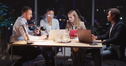 Creative multi-ethnic business team of smart corporate colleagues sitting Stock Footage 147403616