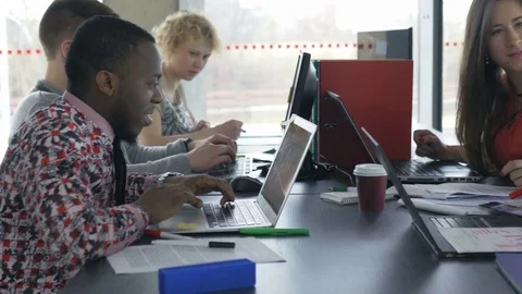 Creative multiracial workers at their computers in the office Stock-Footage 73850996