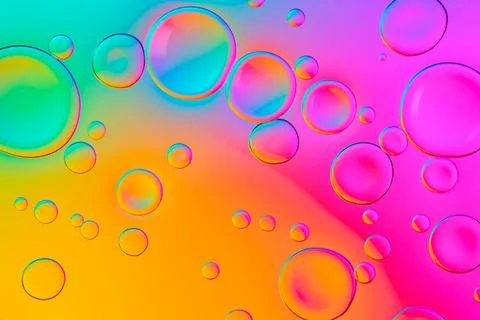 Creative neon background with drops. Glowing abstract backdrop with vibrant Stock Photos