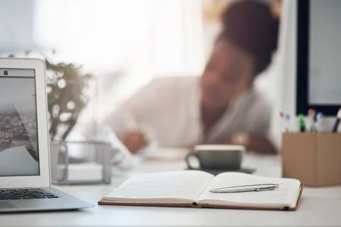 Creative, notebook and laptop on desk in office, journalism or brainstormin.. Stock Photos