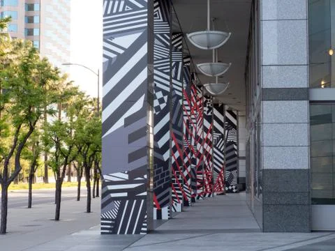 Creative office building design and artwork of entrance on ground floor Stock Photos