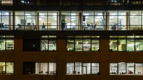 Creative office workers in the end of working day time lapse Stock Footage 104417650