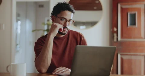 Creative, online and man with laptop, home and research for article, remote work 動画素材 335812384