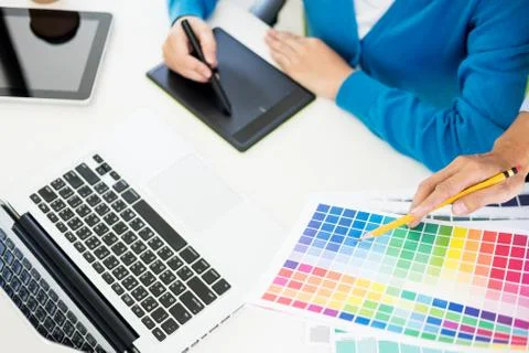 Creative or Interior designers teamwork with pantone swatch and building plan Stock Photos