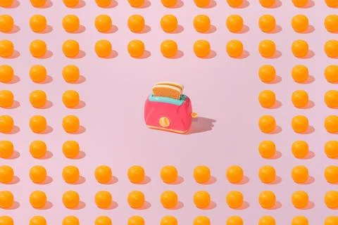 Creative orange and toaster bread pattern flat lay on pink background minim.. Stock Photos