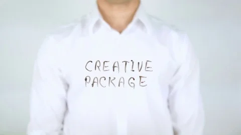 Creative Package, Man Writing on Glass Stock Footage 77819266