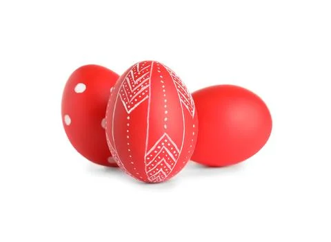 Creative painted red Easter eggs on white background Stock Photos