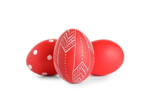 Creative painted red Easter eggs on white background Stock Photos