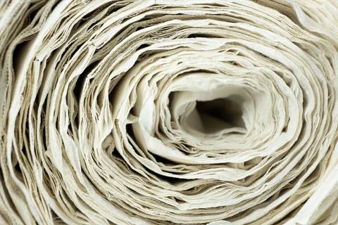 Creative paper roll swirl pattern close up. Stock Photos