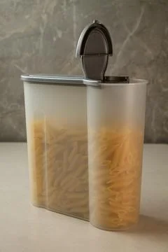 Creative pasta storage solution showcases modern kitchen design elegance Stock Photos