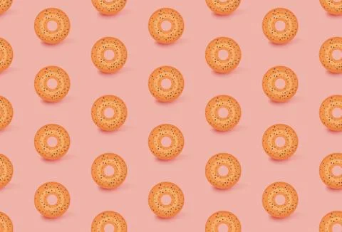 Creative pattern from floating donuts with shadows on light orange background 스톡 일러스트