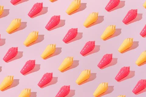 Creative pattern ice cream vanilla and strawberry cone pastel pink background Stock Photos