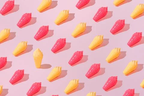 Creative pattern ice cream vanilla and strawberry cone pastel pink background Stock Photos
