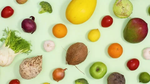 Creative pattern made of fruits and vegetables move up and down. Stop motion Stock Footage 154523825