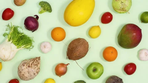 Creative pattern made of fruits and vegetables blinking. Stop motion Stock Footage 154524047