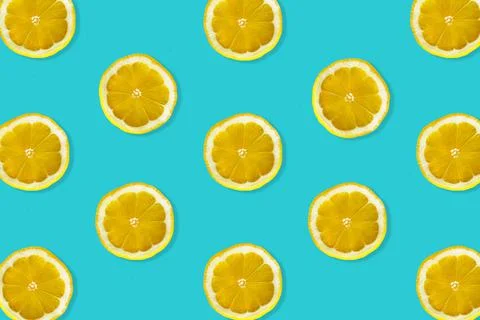 Creative pattern made of lemon. Stock Photos