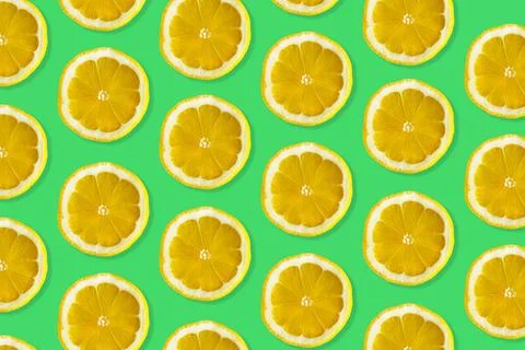 Creative pattern made of lemon. Stock Photos