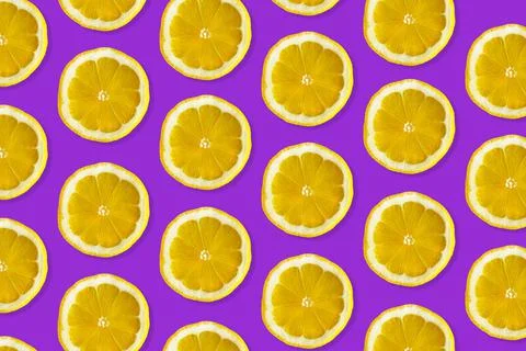 Creative pattern made of lemon. Stock Photos