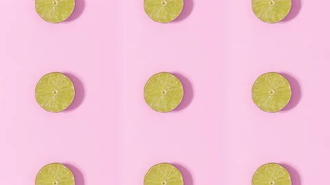 Creative pattern made of lemons and limes rotating and changing. Stop motion Stock Footage 153180170
