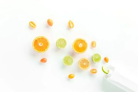 Creative pattern made of summer tropical fruits: orange, lemon, lime. Food Stock Photos