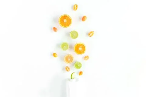 Creative pattern made of summer tropical fruits: orange, lemon, lime. Food Stock Photos